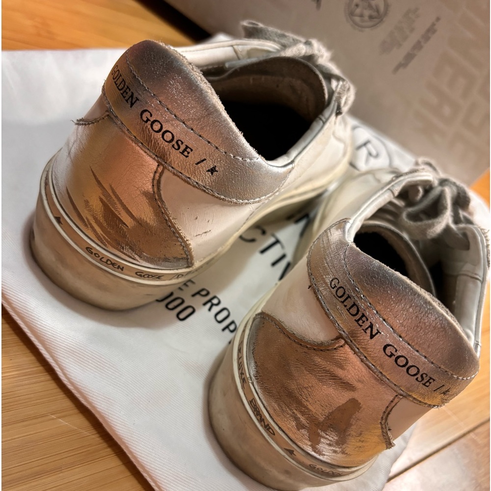 Woman’s golden goose high star classic with spur size 8